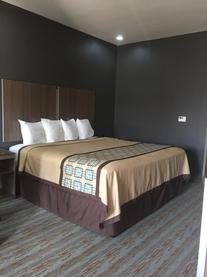 Scottish Inn & Suites - Конро Екстериор снимка