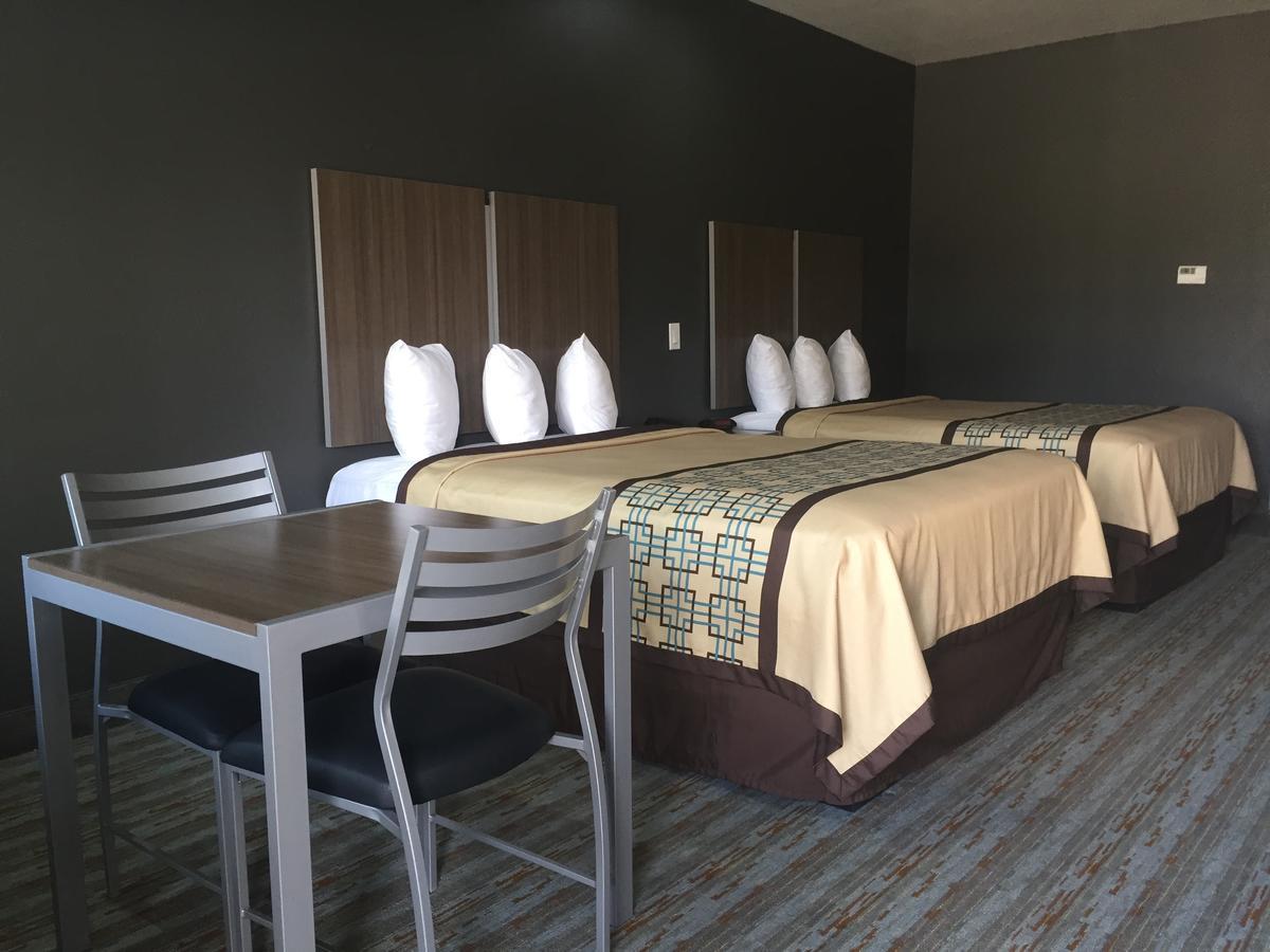 Scottish Inn & Suites - Конро Екстериор снимка
